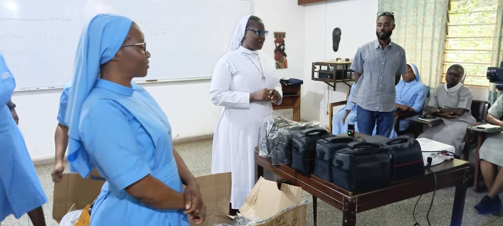 Kumasi: Sister Communicators in Ghana Poised to Effectively Use New Cameras, Branded Jackets